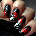 Nails with black, white, and red floral design on a dark background, Obroi