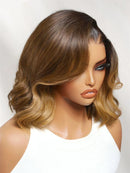 Mannequin head with a brown and blonde wig on a white background, Obroi
