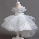 White sparkly dress on a mannequin against a dark background, Obroi