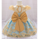 Lace dress with a large bow on a mannequin against a white background, Obroi