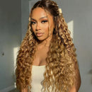 Woman with long, wavy hair styled with a clip against a neutral background, Obroi