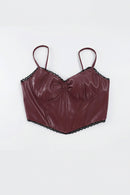 Maroon leather corset top with lace trim on a white background, Obroi