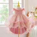 Pink children's dress on a mannequin with a decorative background, Obroi