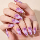 A close-up of hands with long almond-shaped nails decorated in a pink and white marble pattern, set against a soft beige background, Obroi