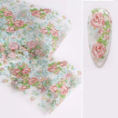 Floral patterned ironing board cover with a close-up of a floral design on a white background, Obroi