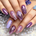 Nails with purple and pink gradient design on a glittery background, Obroi
