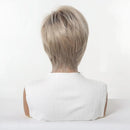 Back view of a short layered wig on a mannequin head, showing a light ash blonde color with subtle gray undertones. A vertical measurement arrow on the right indicates a length of 20cm / 8 inch, Obroi