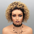 Mannequin head with curly blonde hair and black lace necklace on a gray background, Obroi