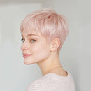 Woman with short pink hair against a plain background, Obroi