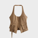 Brown vest with pockets on a light gray background, Obroi