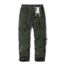 Green cargo pants with multiple pockets on a white background, Obroi