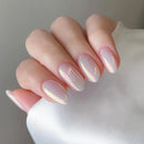 Hand with iridescent pink nail polish on a neutral background, Obroi