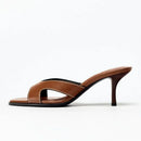 Brown high-heeled sandal on a white background, Obroi