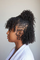 A split image showing a woman with short curly black hair on the left and two black textured hair extensions or hair pieces on the right, likely sold together or demonstrating the product, Obroi
