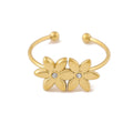 Gold bracelet with two floral designs on a white background, Obroi