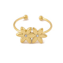 Gold bracelet with two floral designs on a white background, Obroi