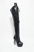 Black knee-high boot with high heel and laces on a white background, Obroi