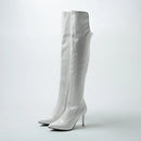 White knee-high boots on a light gray background, Obroi