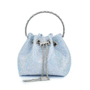 Light blue handbag with silver chain handle and clasp on a white background, Obroi