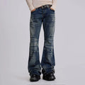 Obroi Person wearing blue flared jeans on a plain background