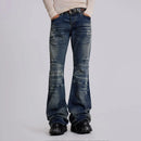 Obroi Person wearing blue flared jeans on a plain background