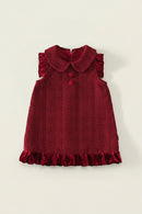 Red dress with a ruffled collar on a light beige background, Obroi