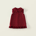 Red dress with a ruffled collar on a light beige background, Obroi