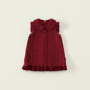 Red dress with a ruffled collar on a light beige background, Obroi