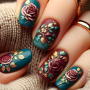 Nails with floral design on a textured surface, Obroi