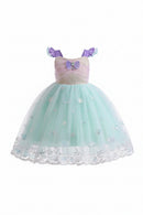 A children's mermaid-style party dress with a lavender bodice, purple shoulder straps, a glittery gold waistband, and a voluminous mint green tulle skirt decorated with shell motifs and a white lace hem. The brand name 'Obroi' is visible in the top left corner, Obroi