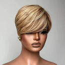 Mannequin head with a styled blonde wig on a plain background, Obroi