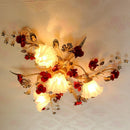 Decorative ceiling light fixture with floral design on a ceiling, Obroi