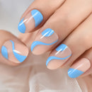 Nails with blue and clear nail polish design on a neutral background, Obroi