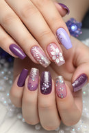 Nails with purple and pink gradient design on a glittery background, Obroi
