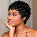 Woman with styled short black hair posing against a neutral background, Obroi