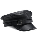 Black leather cap with a buckle on a white background, Obroi