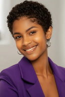 Woman wearing a purple blazer with a blurred background, Obroi