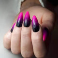 Hand with pink and black gradient nail design on a neutral background, Obroi