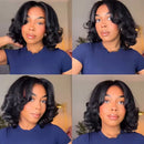 A four-panel collage showing a woman modeling a short, voluminous black wavy wig. The panels show different angles of the wig on a model wearing a navy blue t-shirt in an indoor setting, Obroi