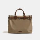 Beige tote bag with brown handles and accents on a white background, Obroi