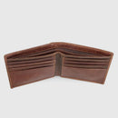 Brown leather wallet on a light gray background, Obroi