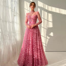 Woman wearing a pink floral dress standing in a softly lit room with white curtains, Obroi