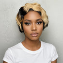 Woman with a styled haircut against a plain background, Obroi