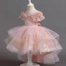 Pink glittery dress on a mannequin against a dark background, Obroi