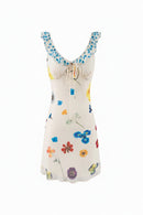 Floral dress with colorful pattern on a white background, Obroi