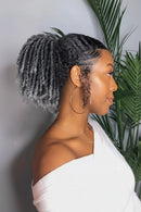 Woman with styled hair and mannequin head with gray braided wig, Obroi