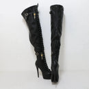 Black platform boots with chain details on a white background, branded 'Obroi'.