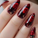 Nails with red rose and heart design on a dark background, Obroi