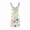 Floral dress with colorful patterns on a white background, Obroi