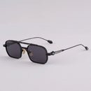 Black sunglasses with dark lenses on a light gray background, Obroi